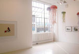 Thumb_3-paintings-alongside-4-jellyfish-shaped-streamers-hanging-from-the-ceiling