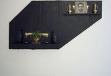 Thumb_black-wall-likecanvas-with-two-shelves-attached-with-a-photo-and-two-candles-and-two-bottles-and-potted-plant