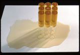 Thumb_9-capsules-of-honey-standing-on-top-of-spilled-honey