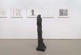 Thumb_5-paintings-of-human-figures-and-heads-and-one-greyish-black-headless-humanoid-statue